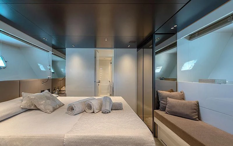 a bed in a room aboard TIBERIAS Yacht for Sale