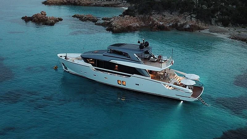 a white boat in the water aboard TIBERIAS Yacht for Sale