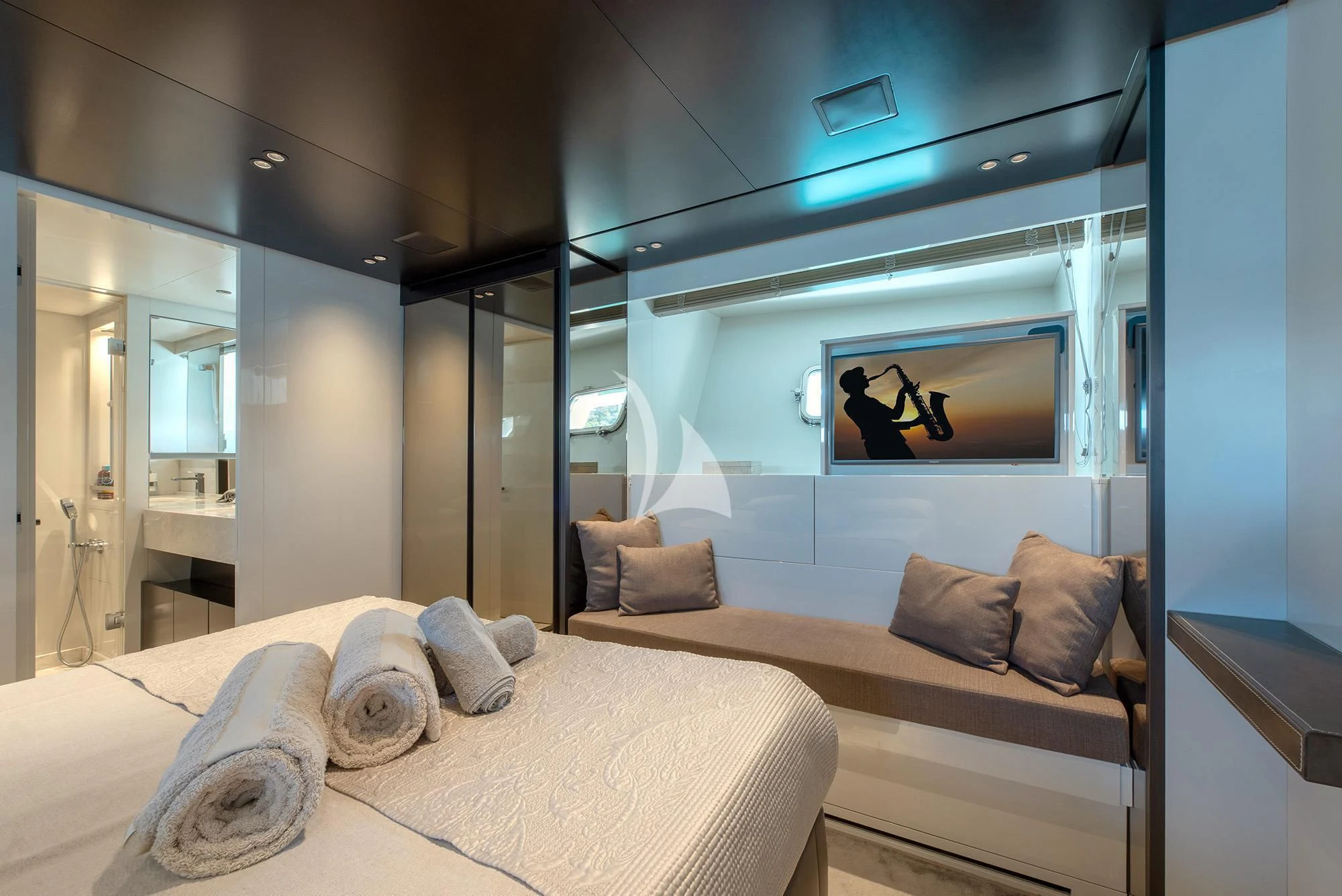 a bed in a room aboard TIBERIAS Yacht for Sale