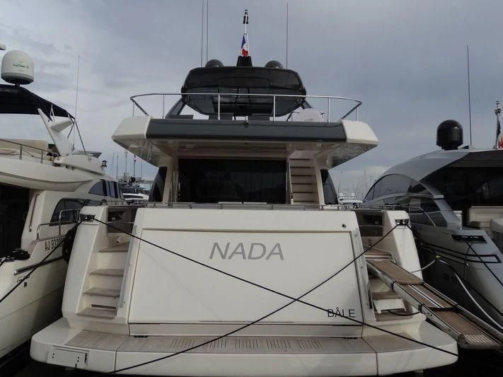 a boat with a dome on the roof aboard DADDY'S DREAM II Yacht for Sale