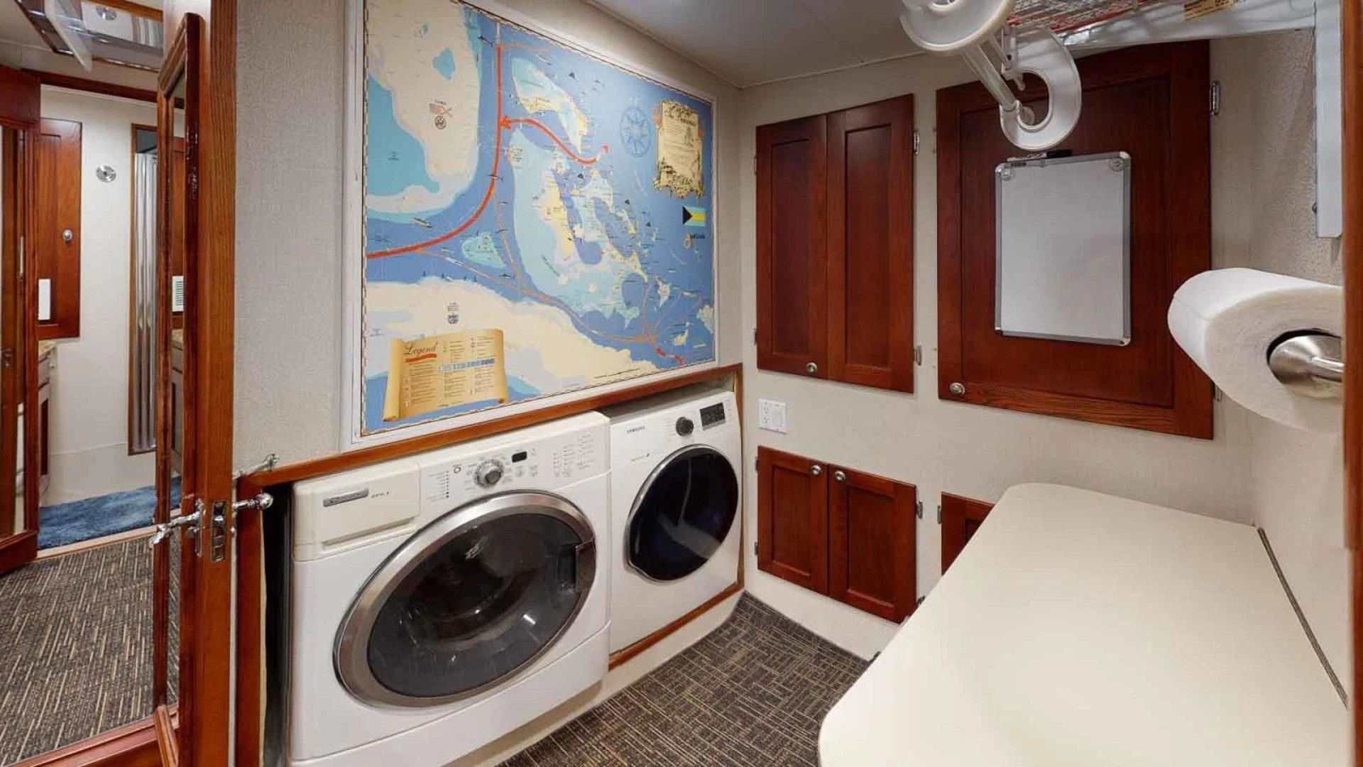 a laundry room with a washing machine aboard LORELEI Yacht for Sale