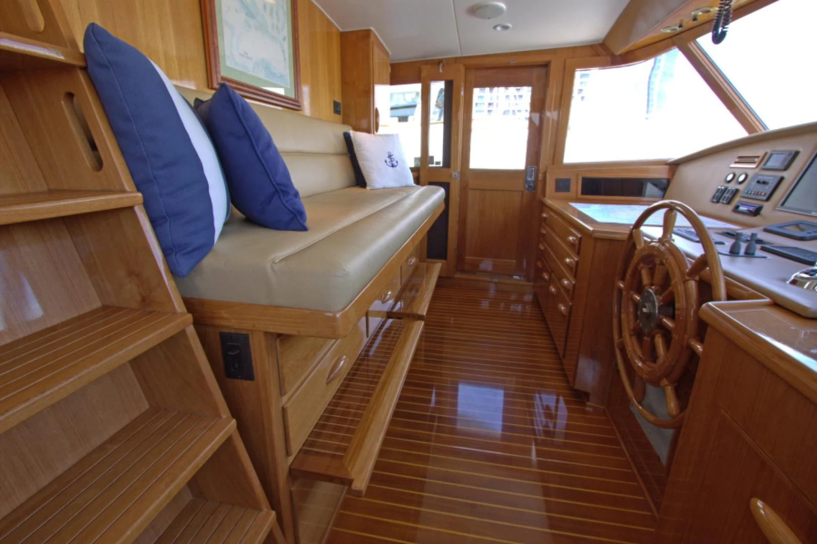 a kitchen with a wood floor aboard LORELEI Yacht for Sale