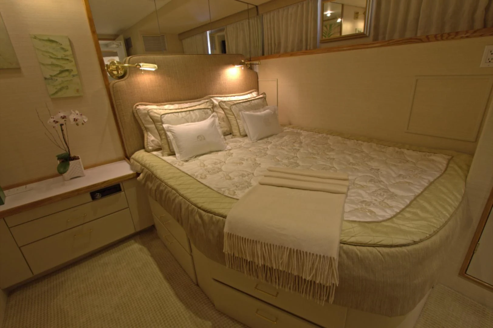 a bed with white sheets aboard LORELEI Yacht for Sale
