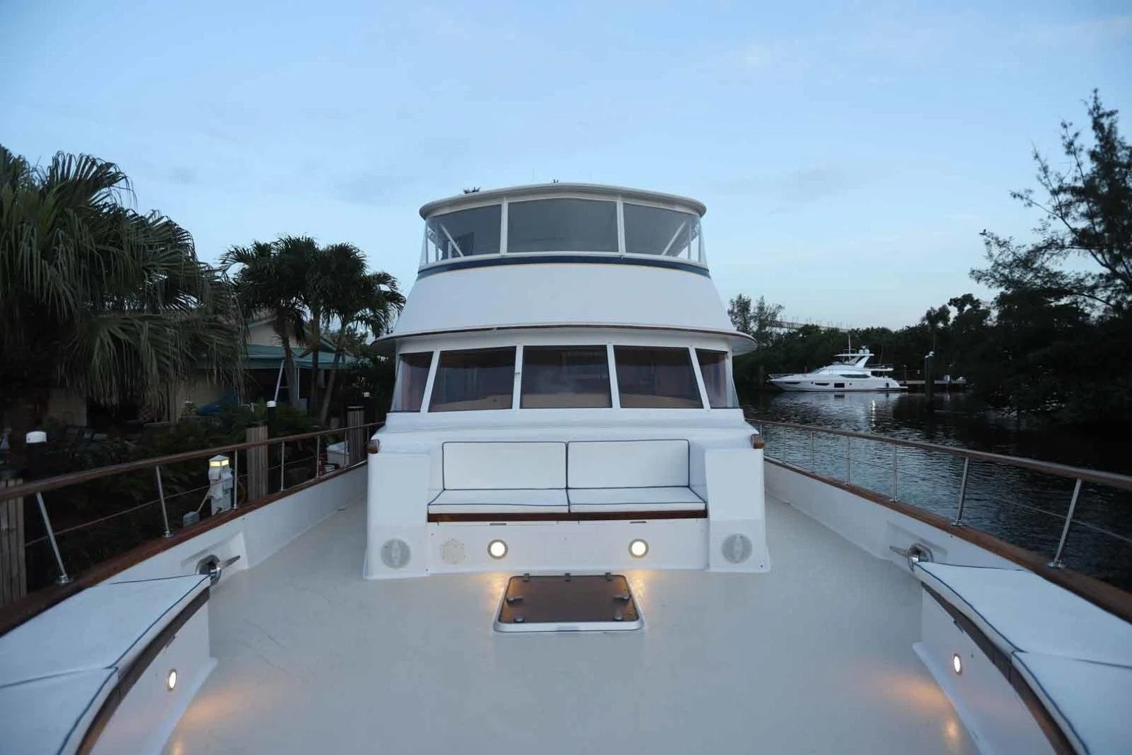 a white boat on a dock aboard LORELEI Yacht for Sale