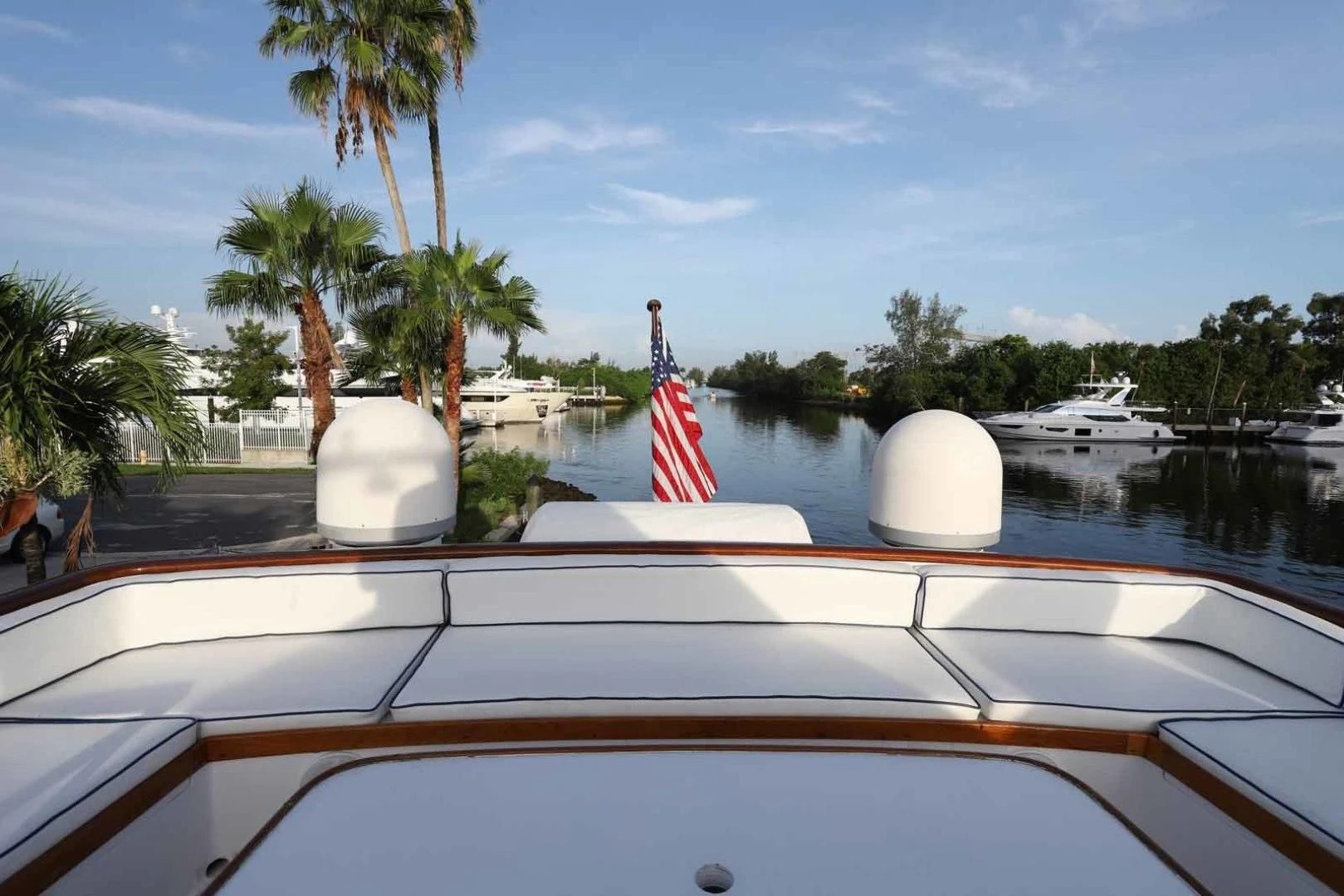 a boat with a flag on the front aboard LORELEI Yacht for Sale