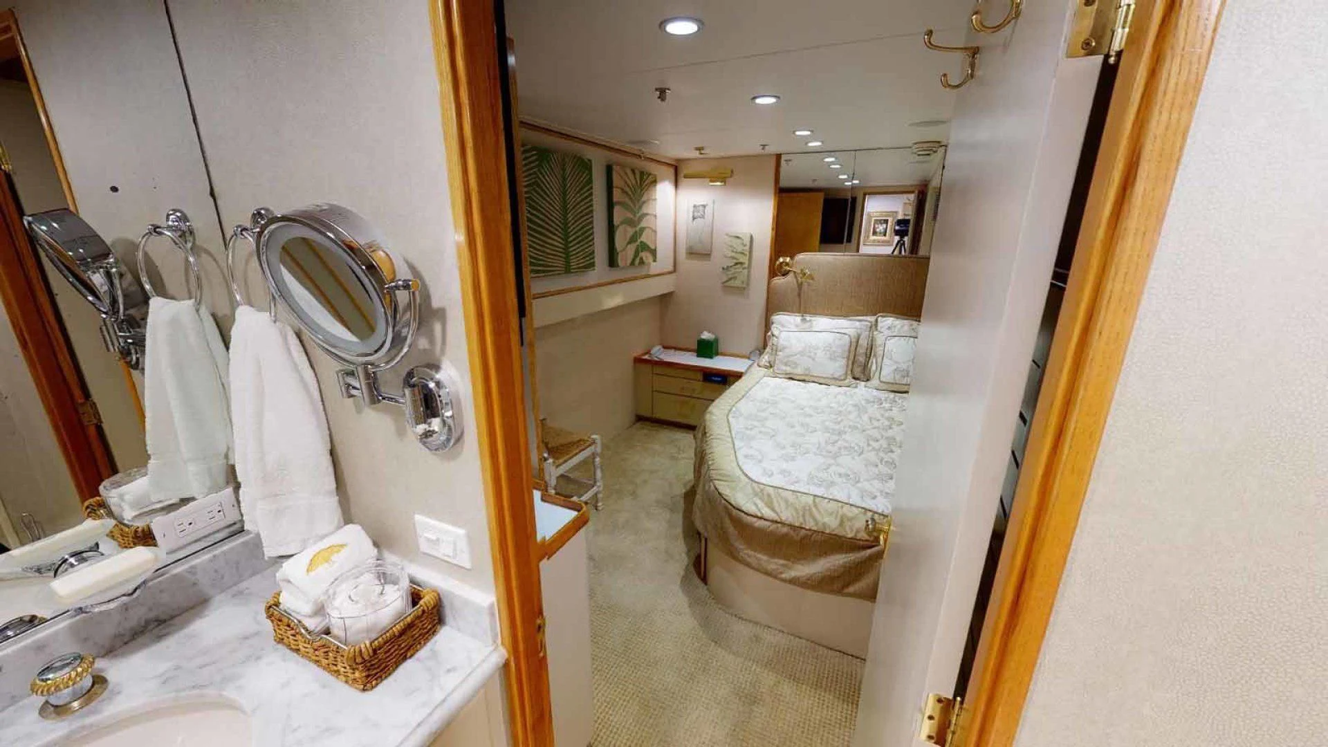 a bathroom with a bed and a mirror aboard LORELEI Yacht for Sale