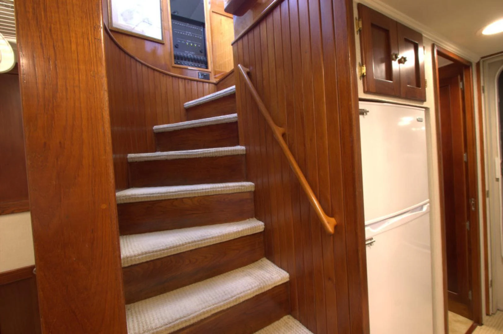 a wooden staircase in a house aboard LORELEI Yacht for Sale