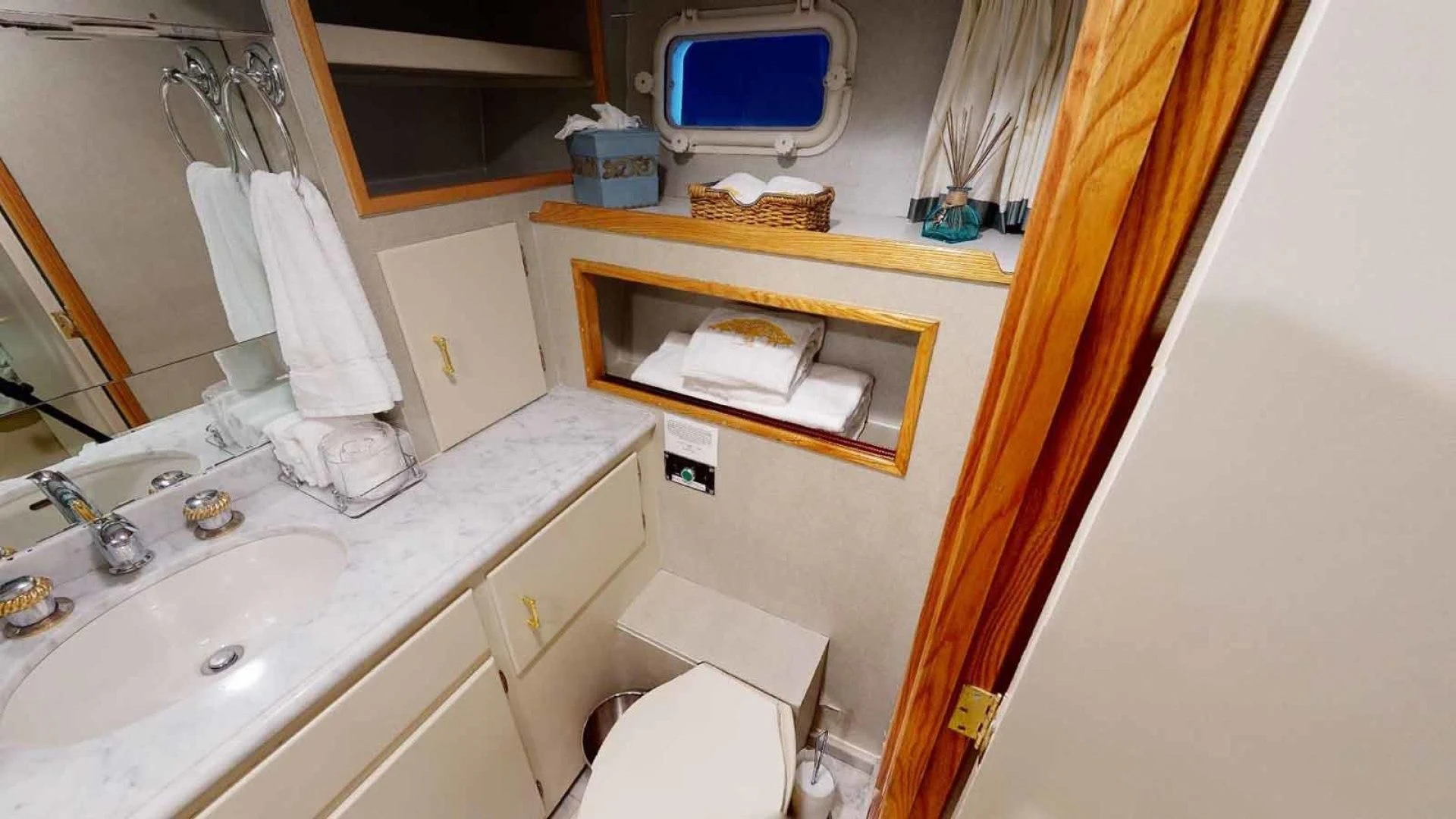 a bathroom with a sink and toilet aboard LORELEI Yacht for Sale