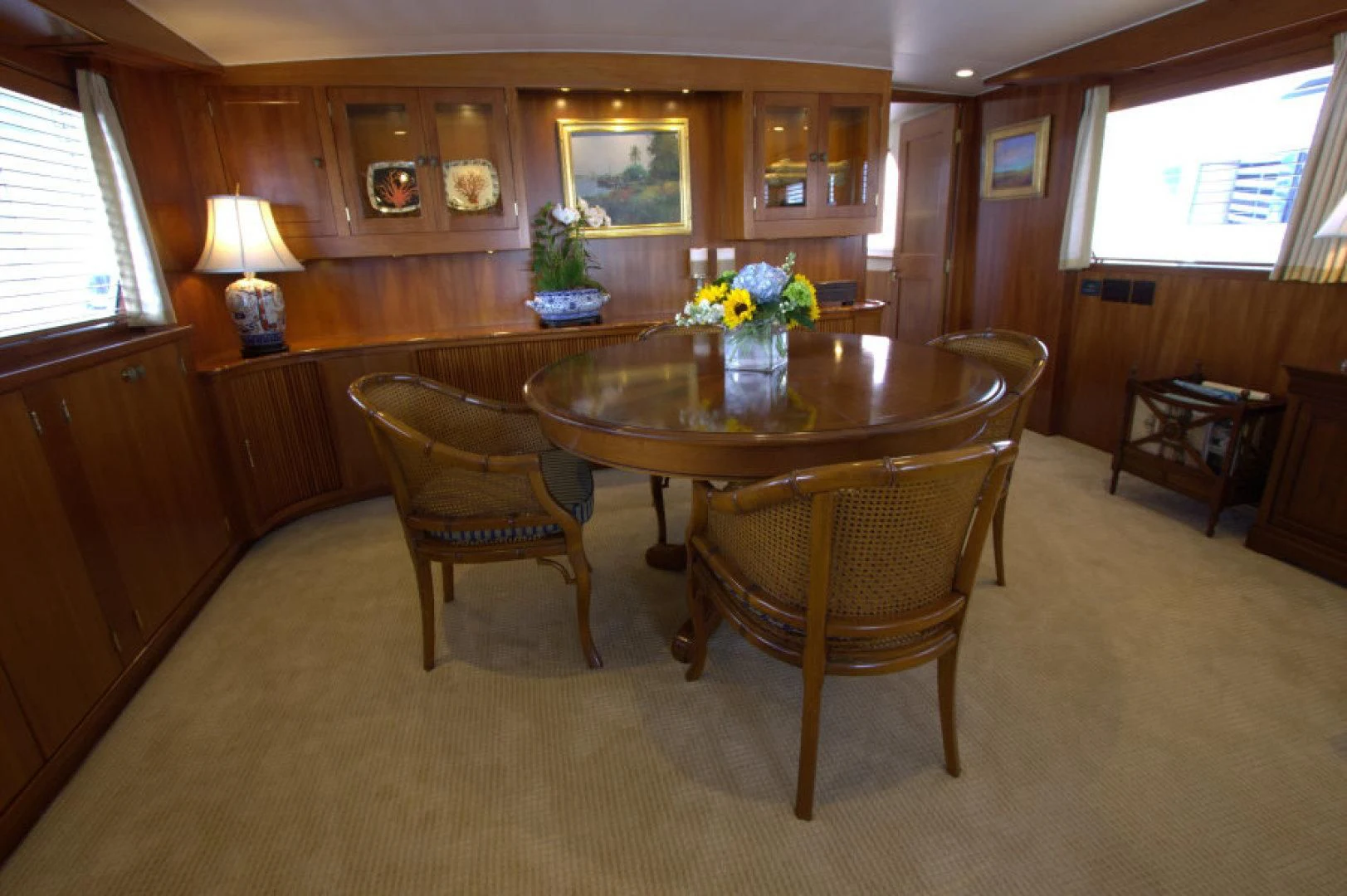 a dining table in a house aboard LORELEI Yacht for Sale