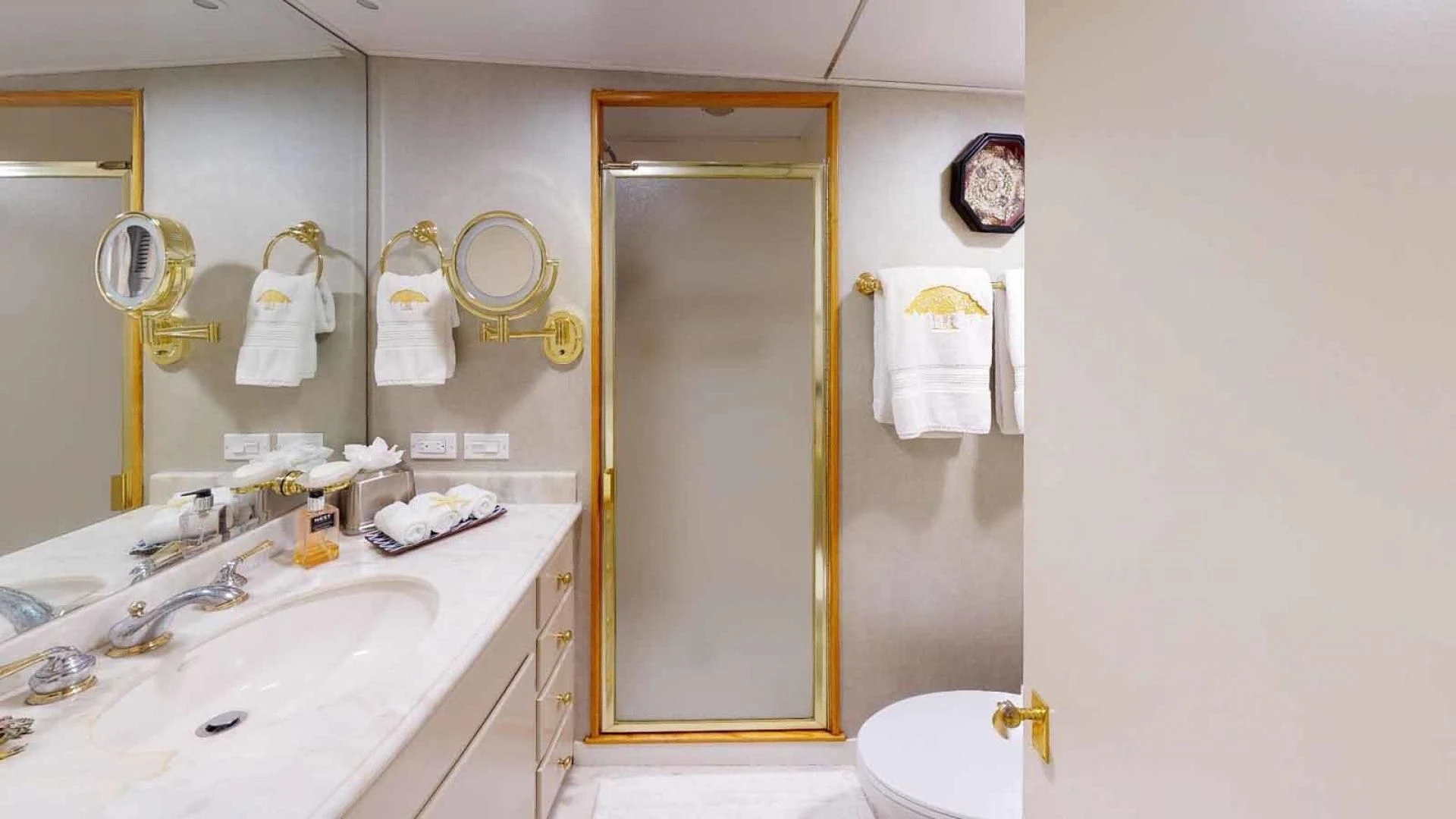 a bathroom with a sink and a mirror aboard LORELEI Yacht for Sale