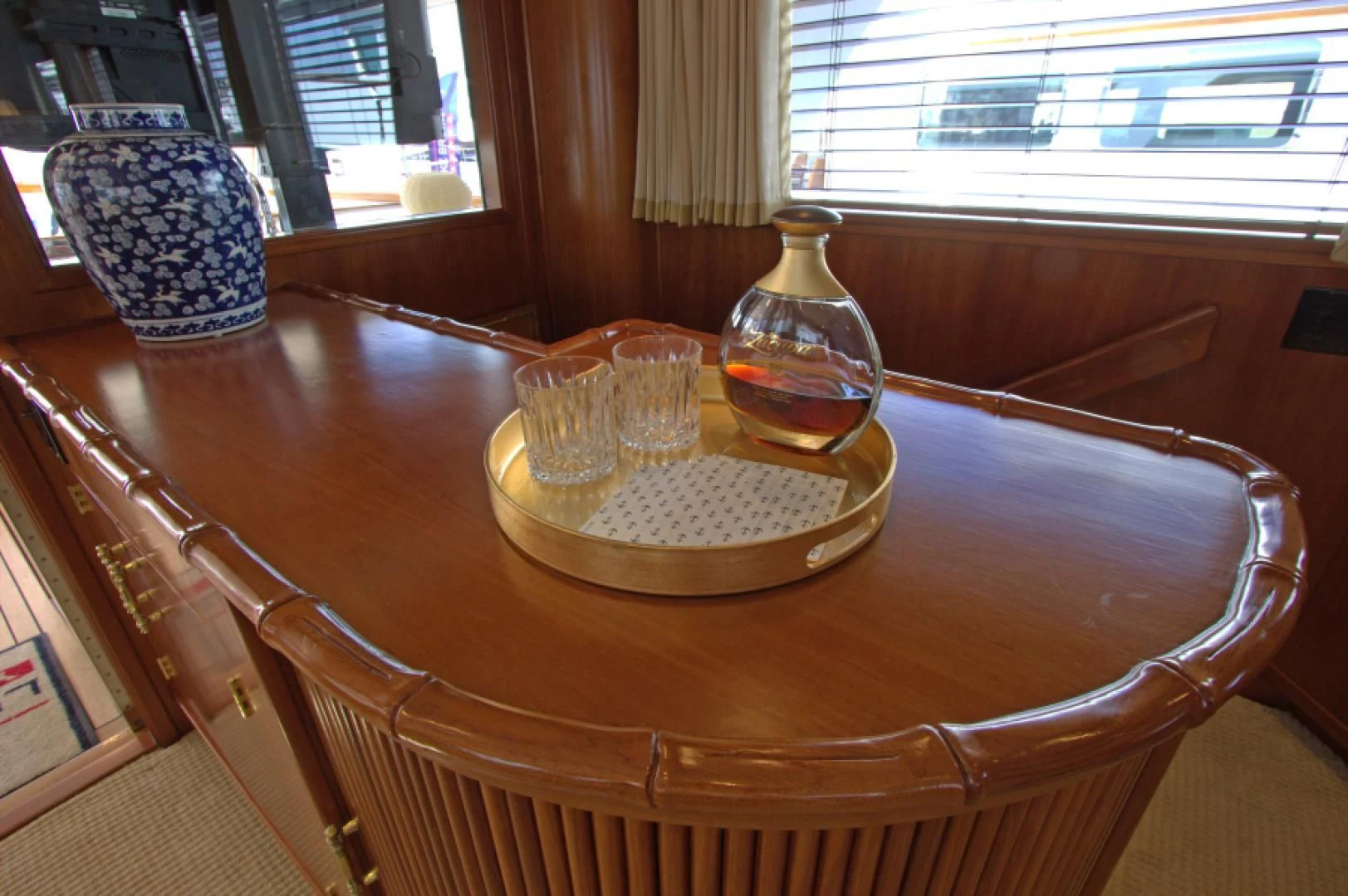 a table with glasses and plates on it aboard LORELEI Yacht for Sale