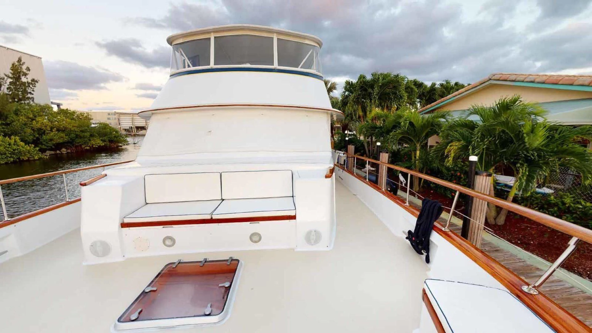 a white boat on a deck aboard LORELEI Yacht for Sale