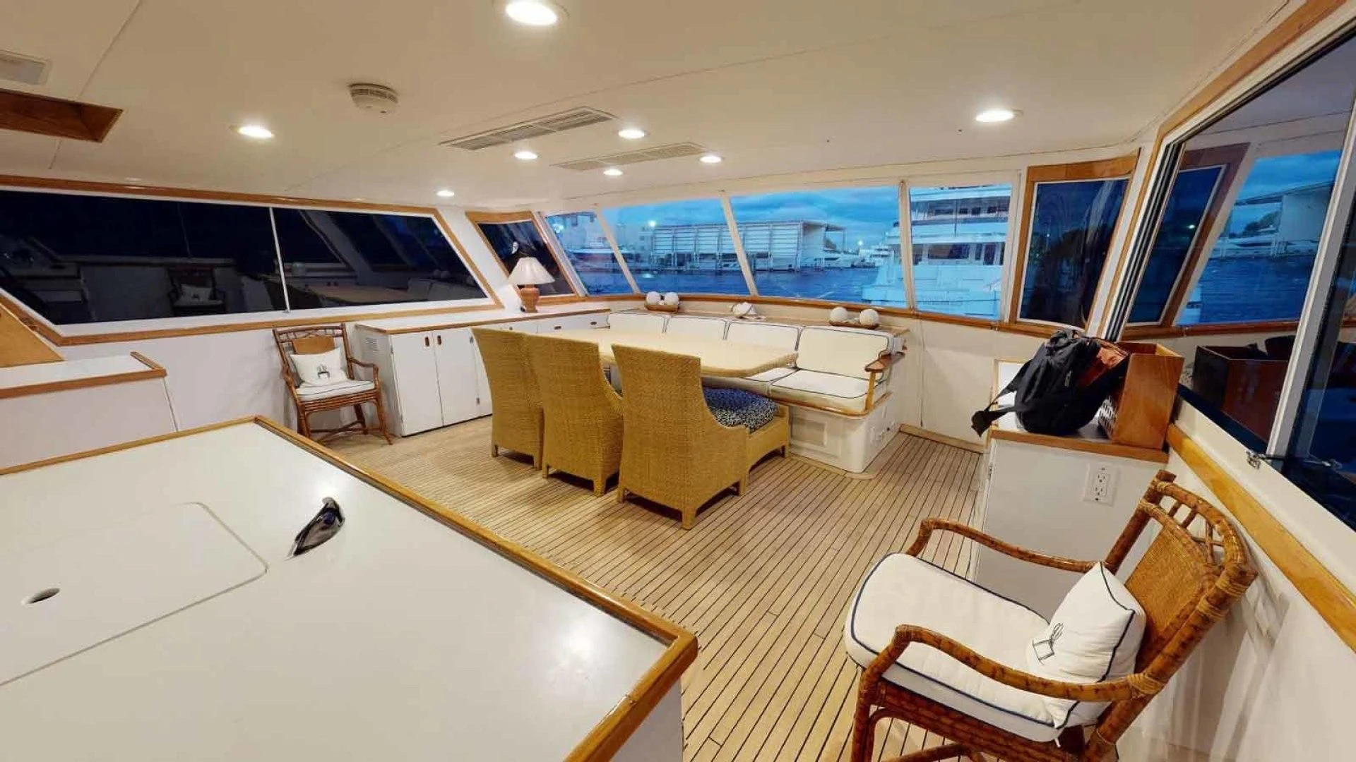a room with couches and chairs aboard LORELEI Yacht for Sale