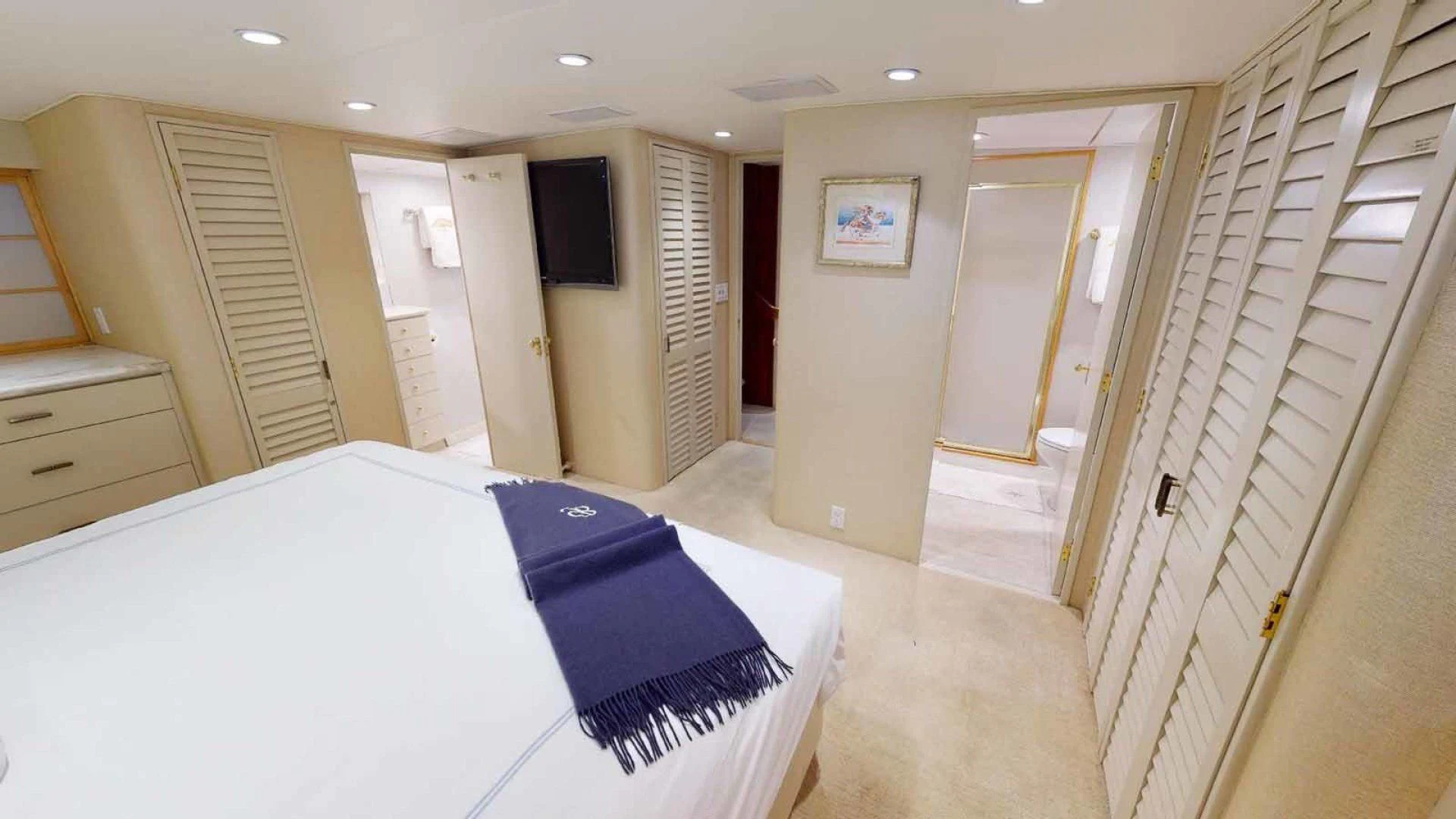 a bed in a room aboard LORELEI Yacht for Sale