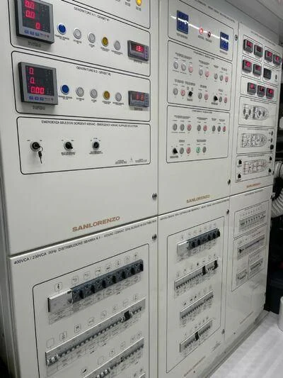 a white board with many buttons aboard PIACERE III Yacht for Sale