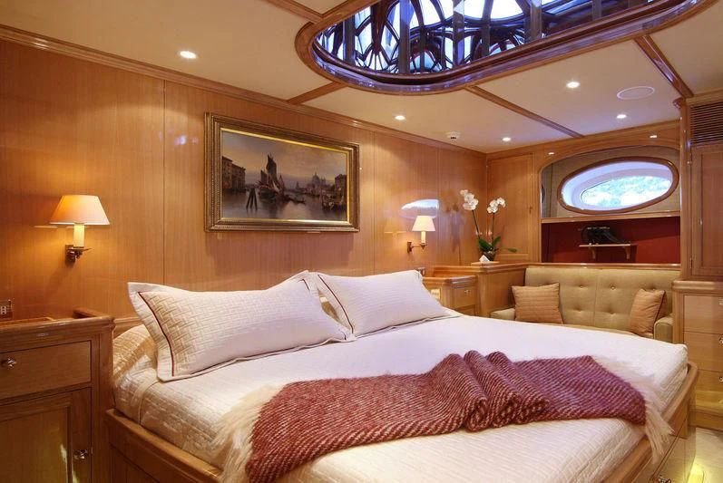 a large bed in a room aboard MARIE Yacht for Sale