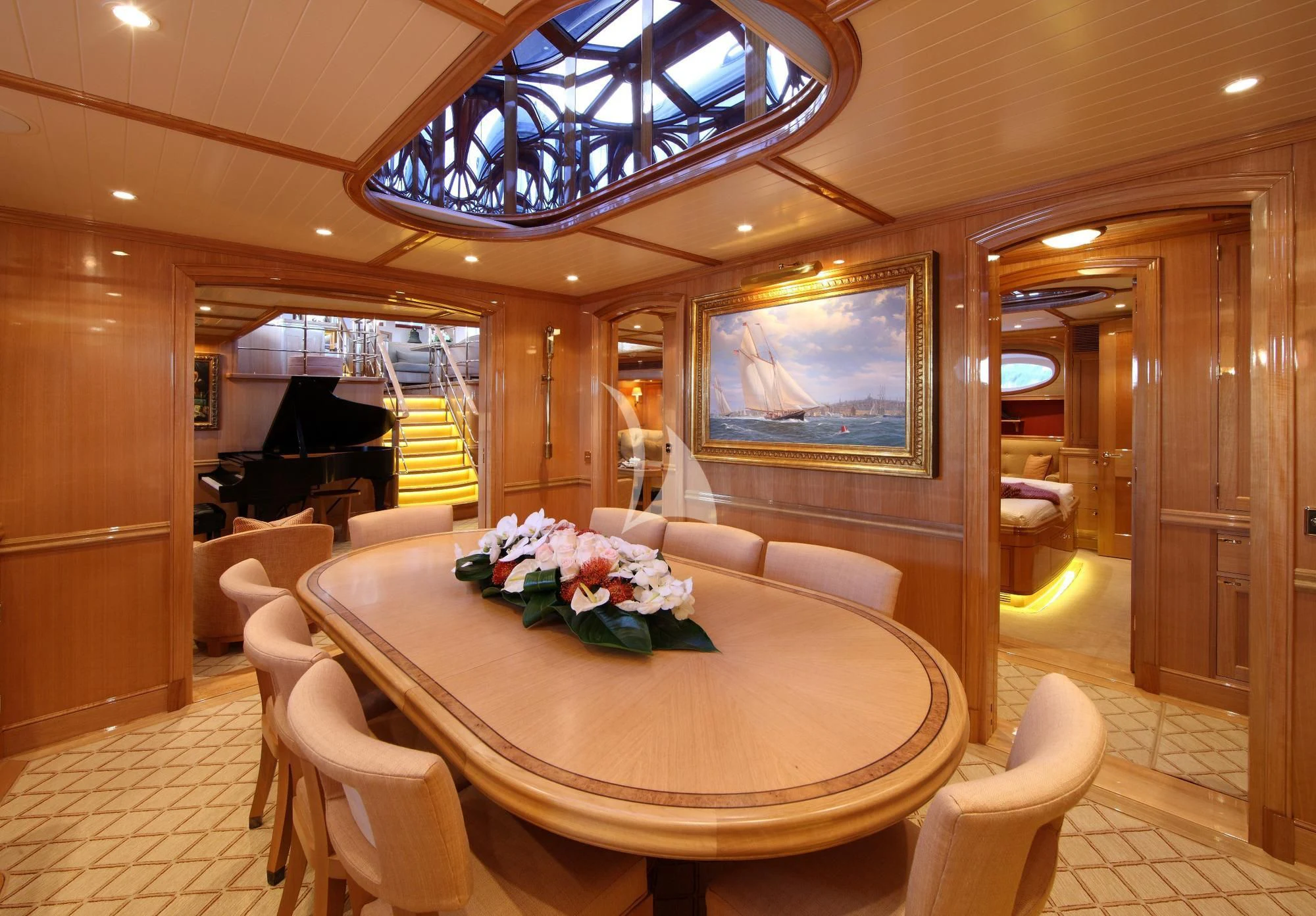 a room with a table and chairs aboard MARIE Yacht for Sale
