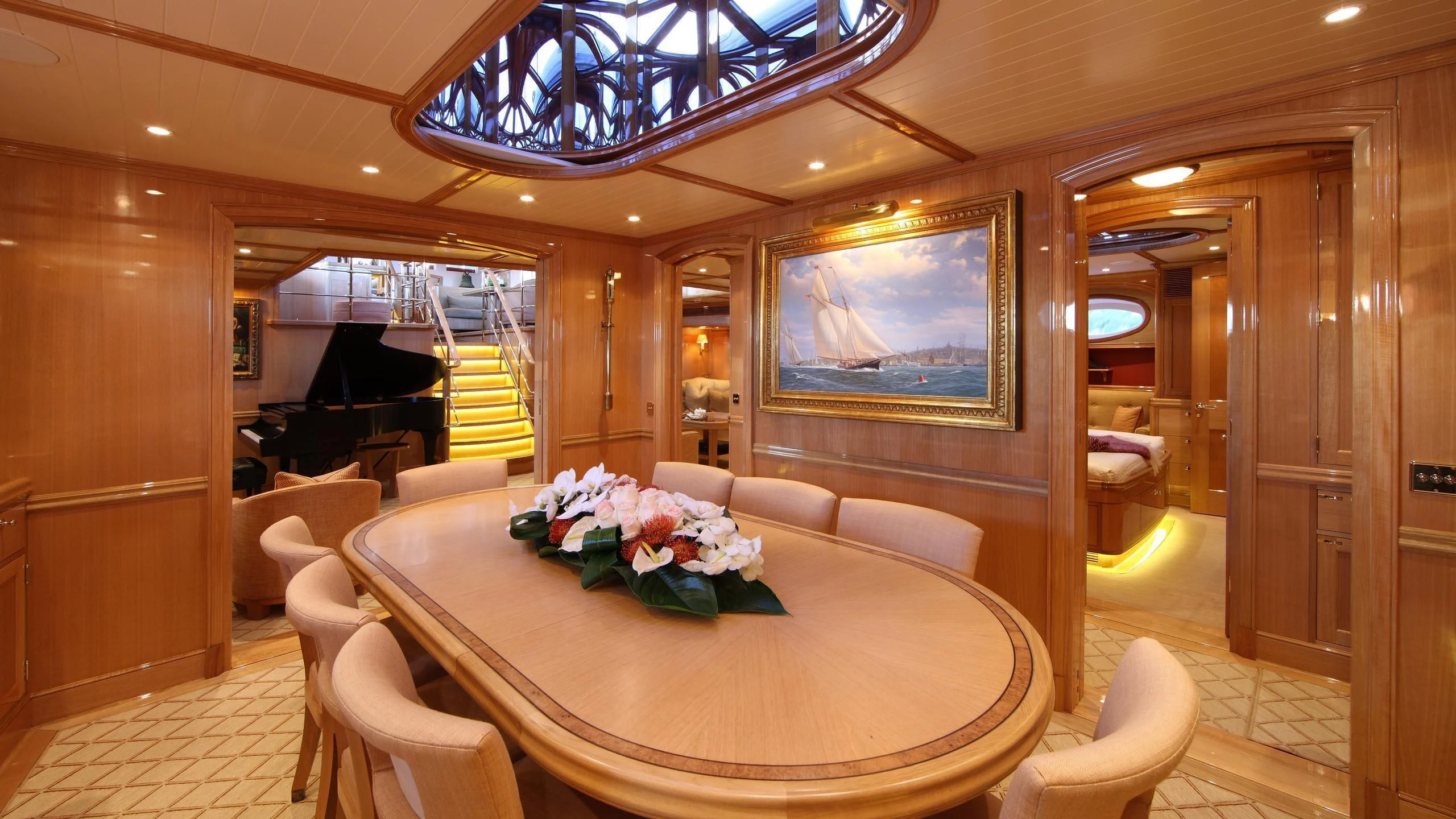 a dining room with a table and chairs aboard MARIE Yacht for Sale