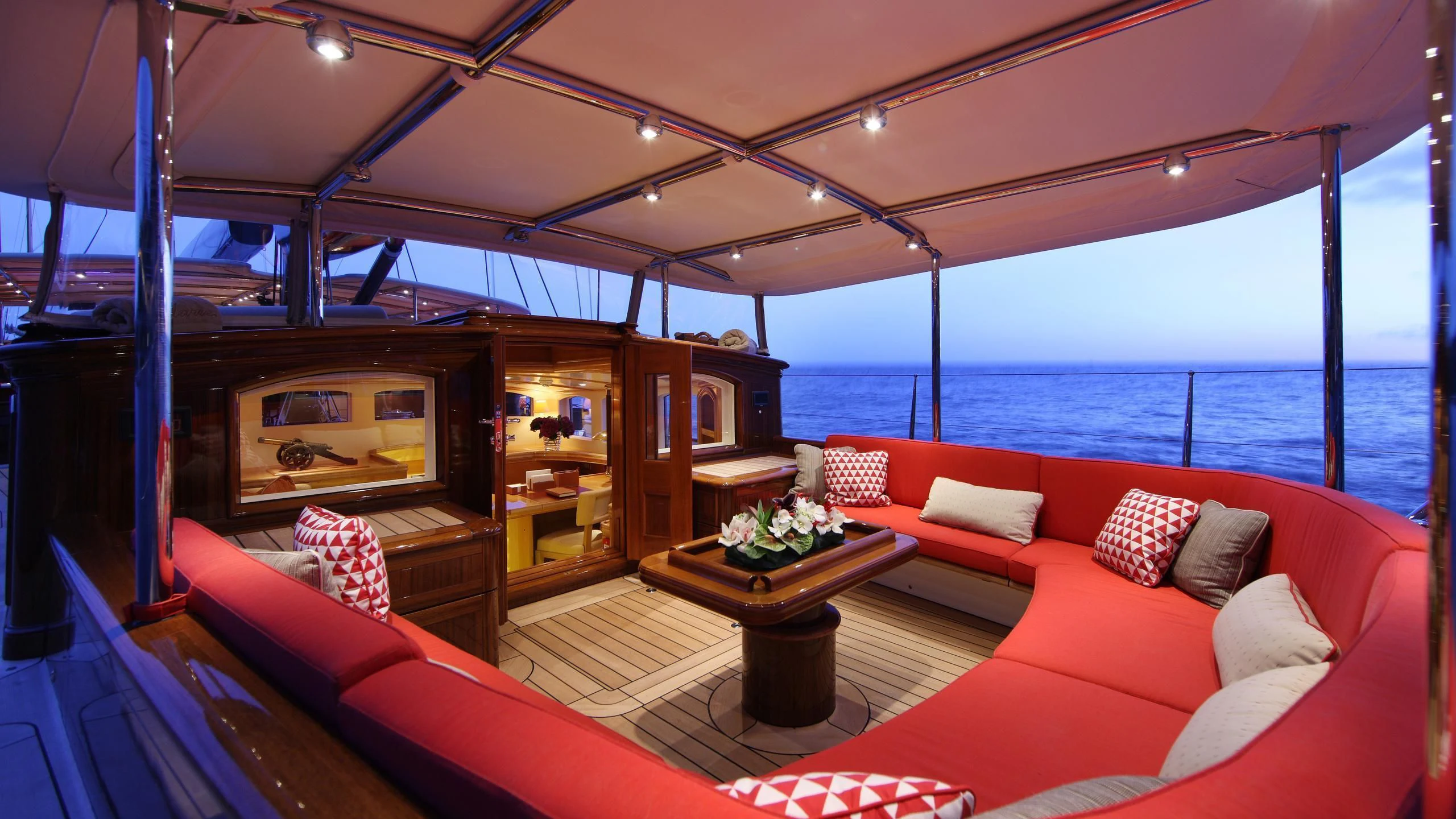a boat with a couch and a table in it aboard MARIE Yacht for Sale