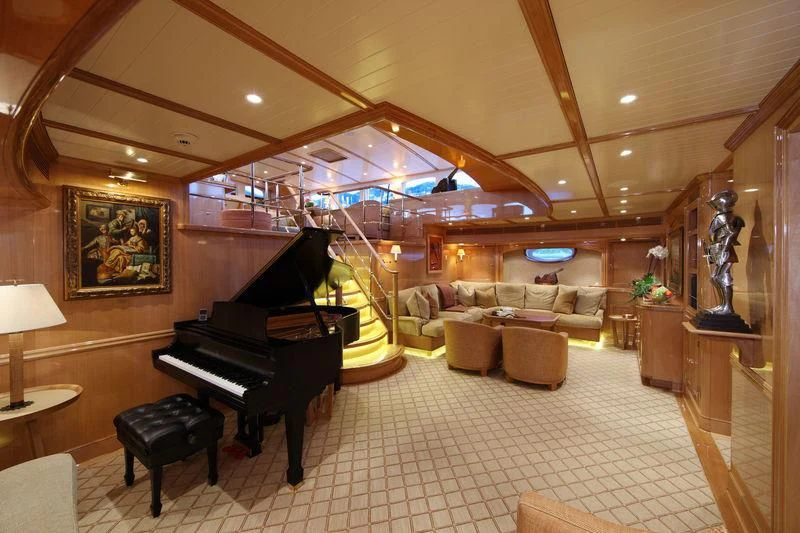 a piano in a room aboard MARIE Yacht for Sale