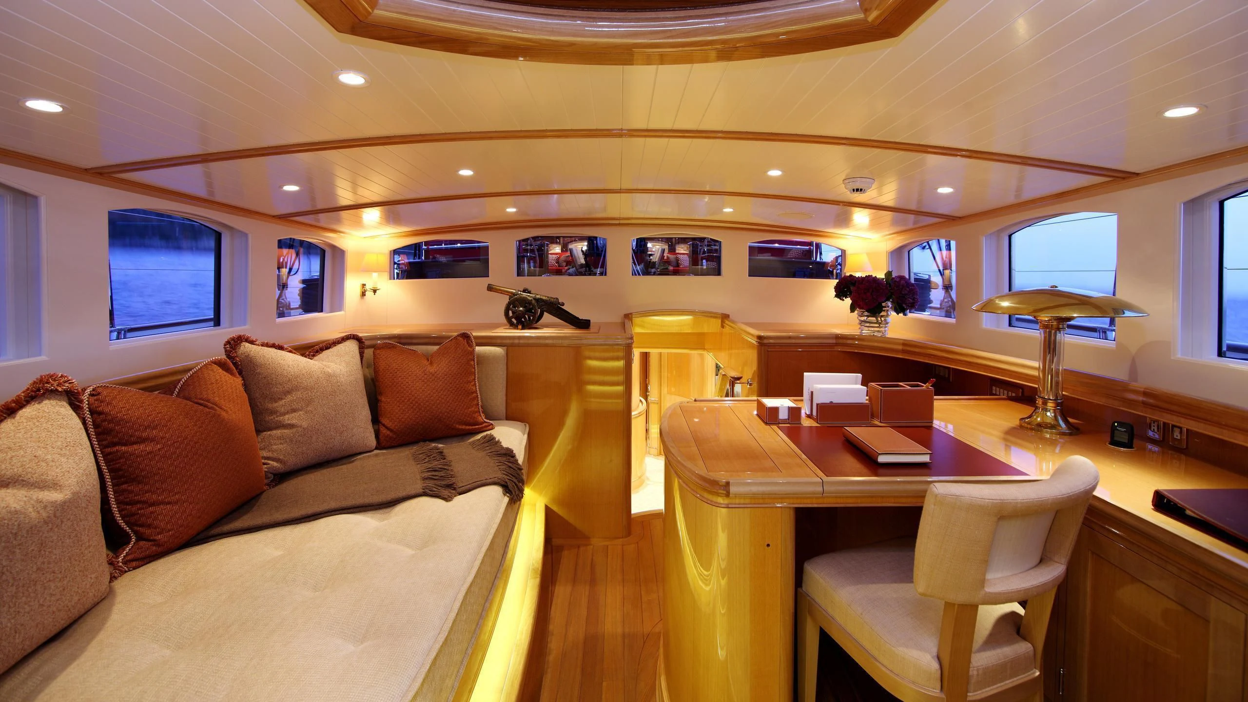 a living room with a couch and a table aboard MARIE Yacht for Sale