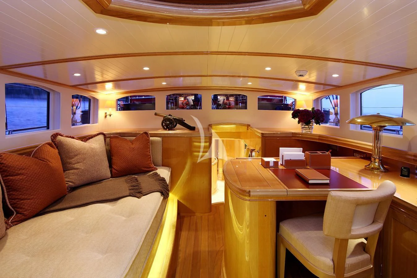 a living room with a couch and a table aboard MARIE Yacht for Sale