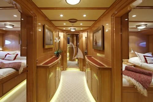 a room with a bed and a mirror aboard MARIE Yacht for Sale