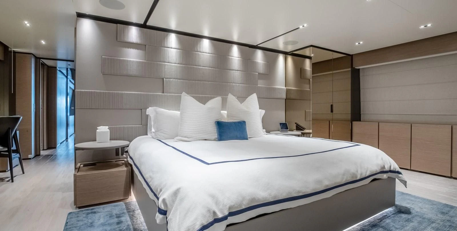 a large bed in a room aboard OCEAN Z Yacht for Sale