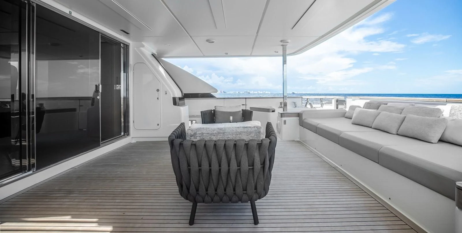 a couch on a deck aboard OCEAN Z Yacht for Sale