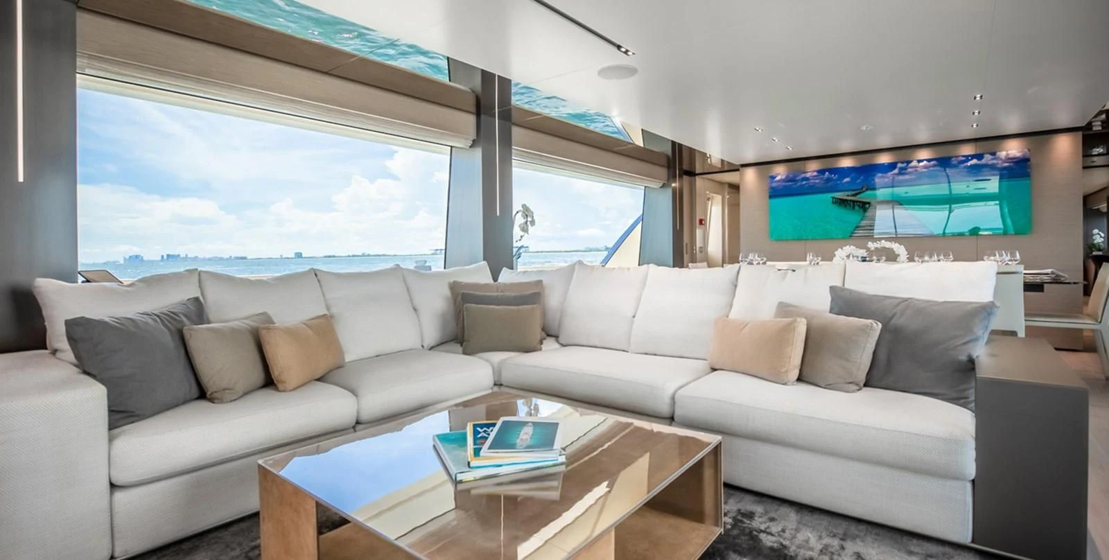 a living room with a large window aboard OCEAN Z Yacht for Sale