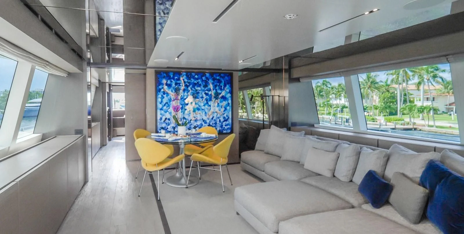 a living room with a couch and a table aboard OCEAN Z Yacht for Sale