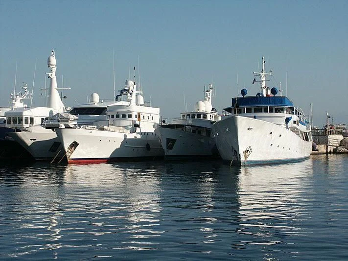 several boats in the water aboard ALBACORA Yacht for Sale