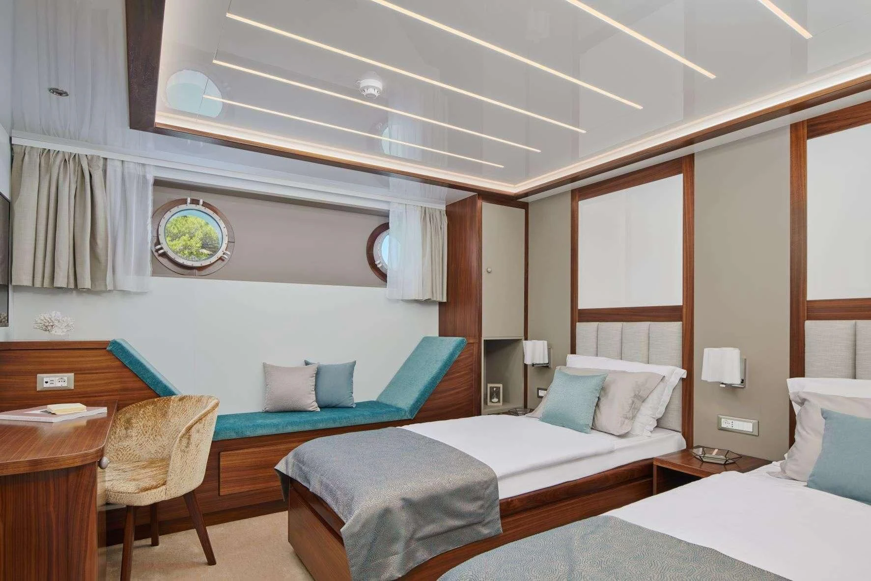 a room with two beds aboard CORSARIO Yacht for Charter