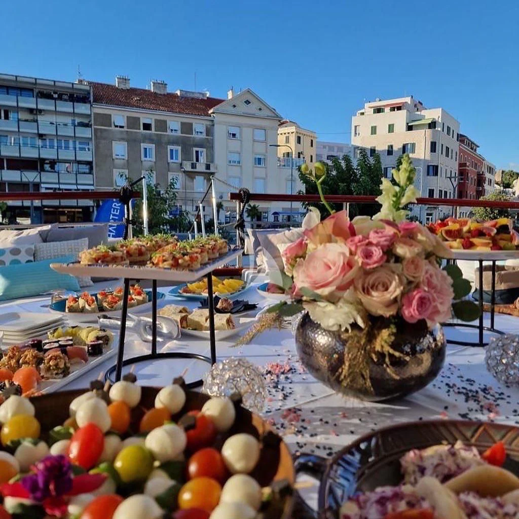 a table with food on it aboard CORSARIO Yacht for Charter