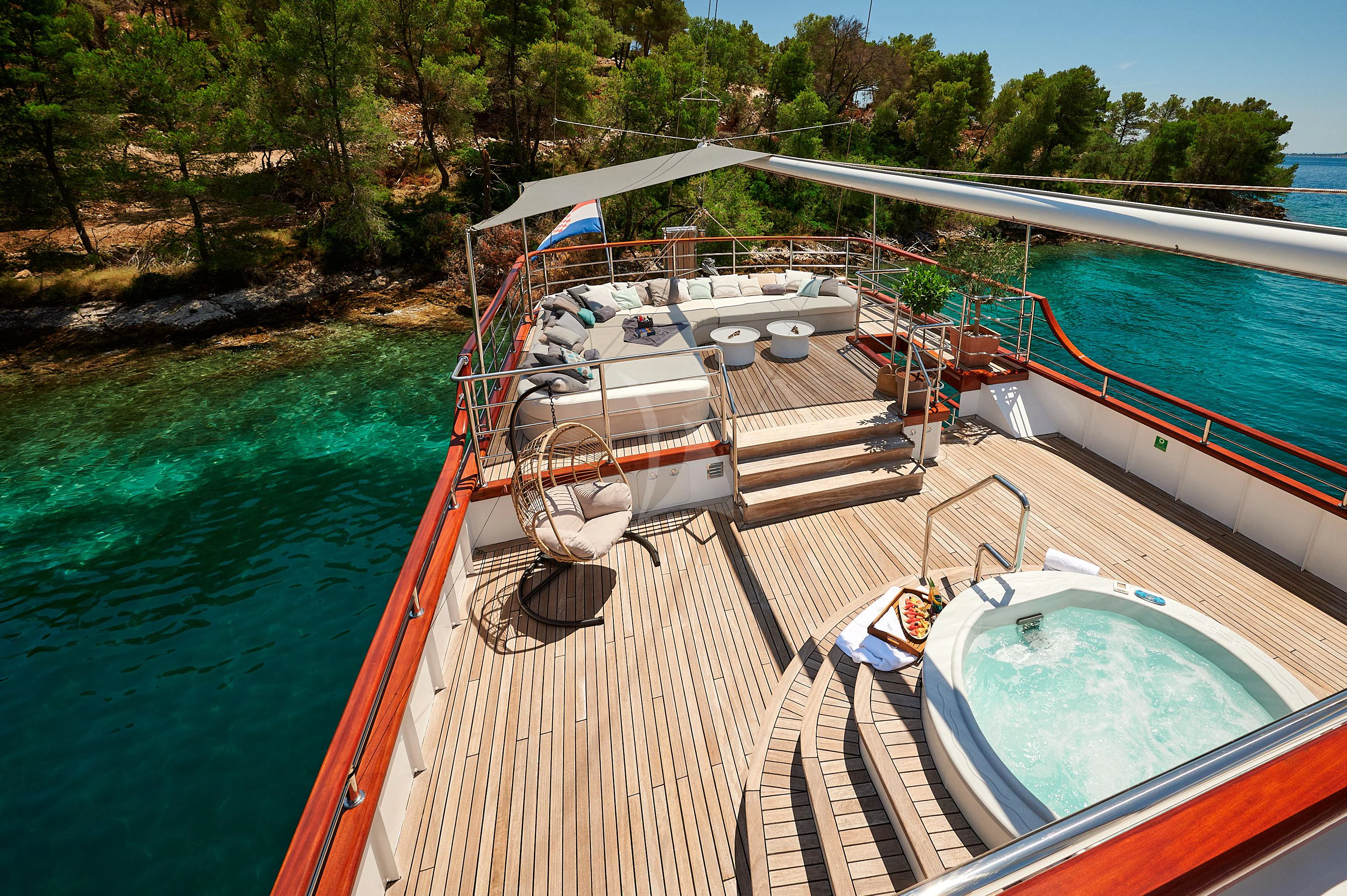a boat docked at a pier aboard CORSARIO Yacht for Charter