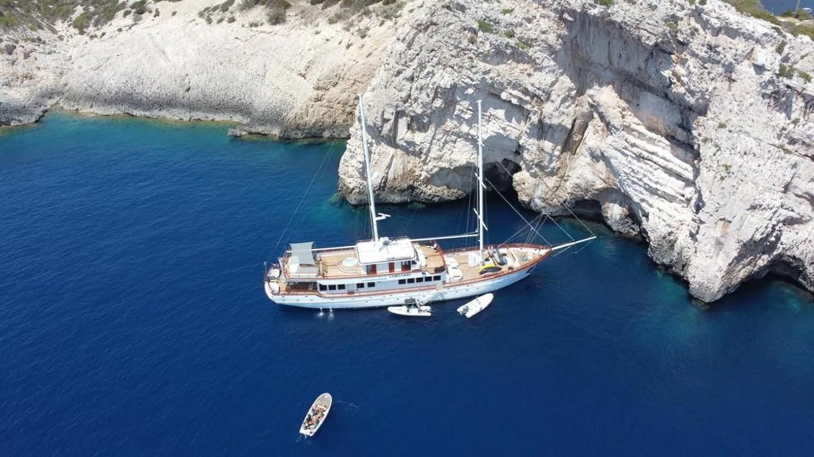 a boat sailing in the water aboard CORSARIO Yacht for Charter
