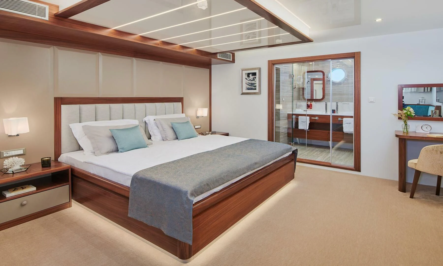 a large bedroom with a bed aboard CORSARIO Yacht for Charter