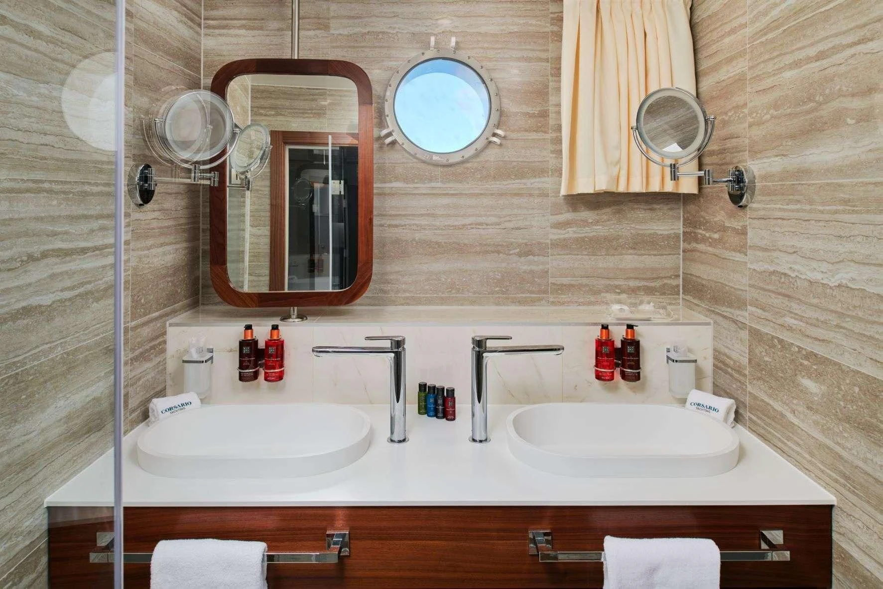a bathroom with two sinks aboard CORSARIO Yacht for Charter