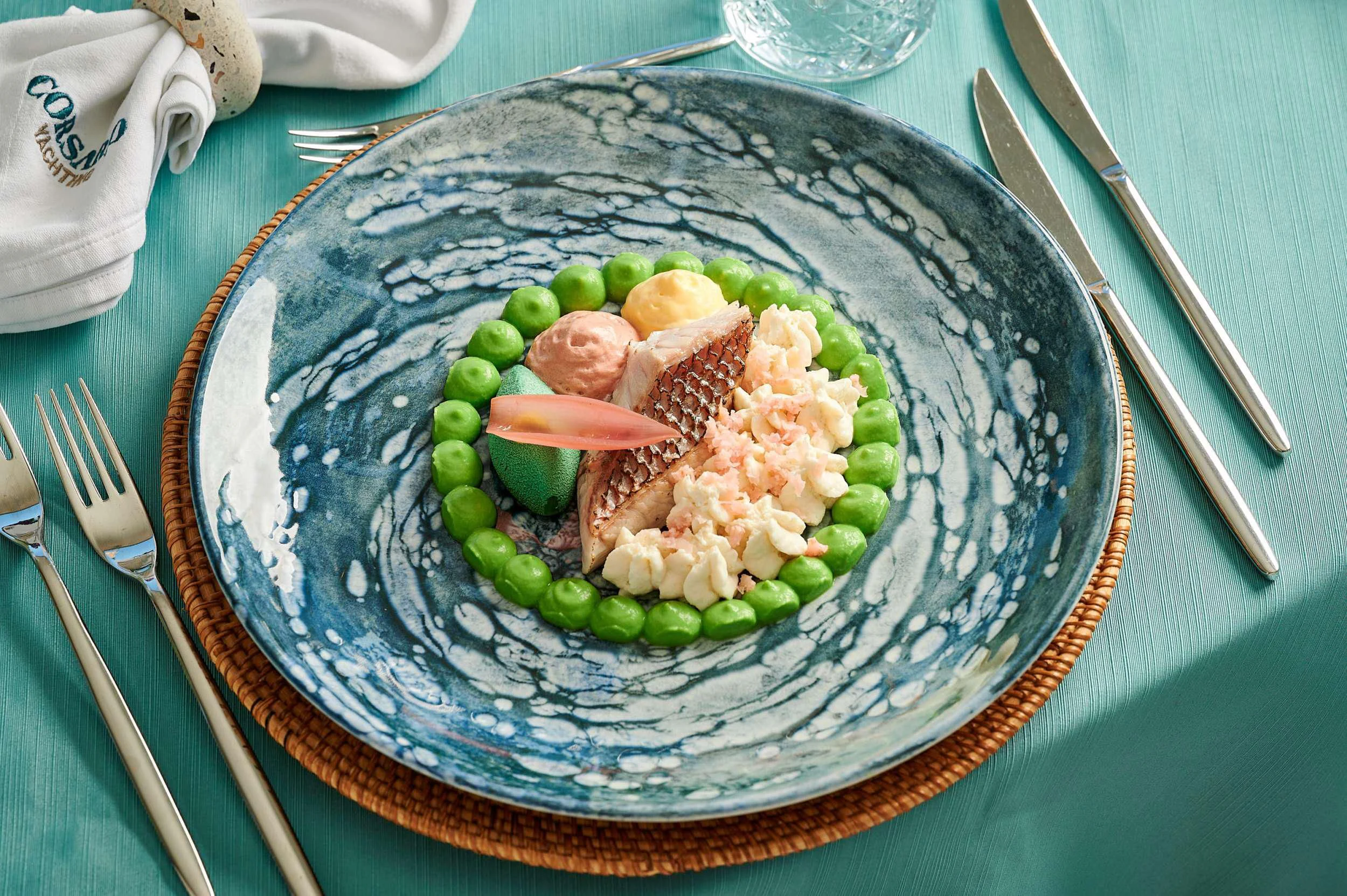 a plate of food aboard CORSARIO Yacht for Charter