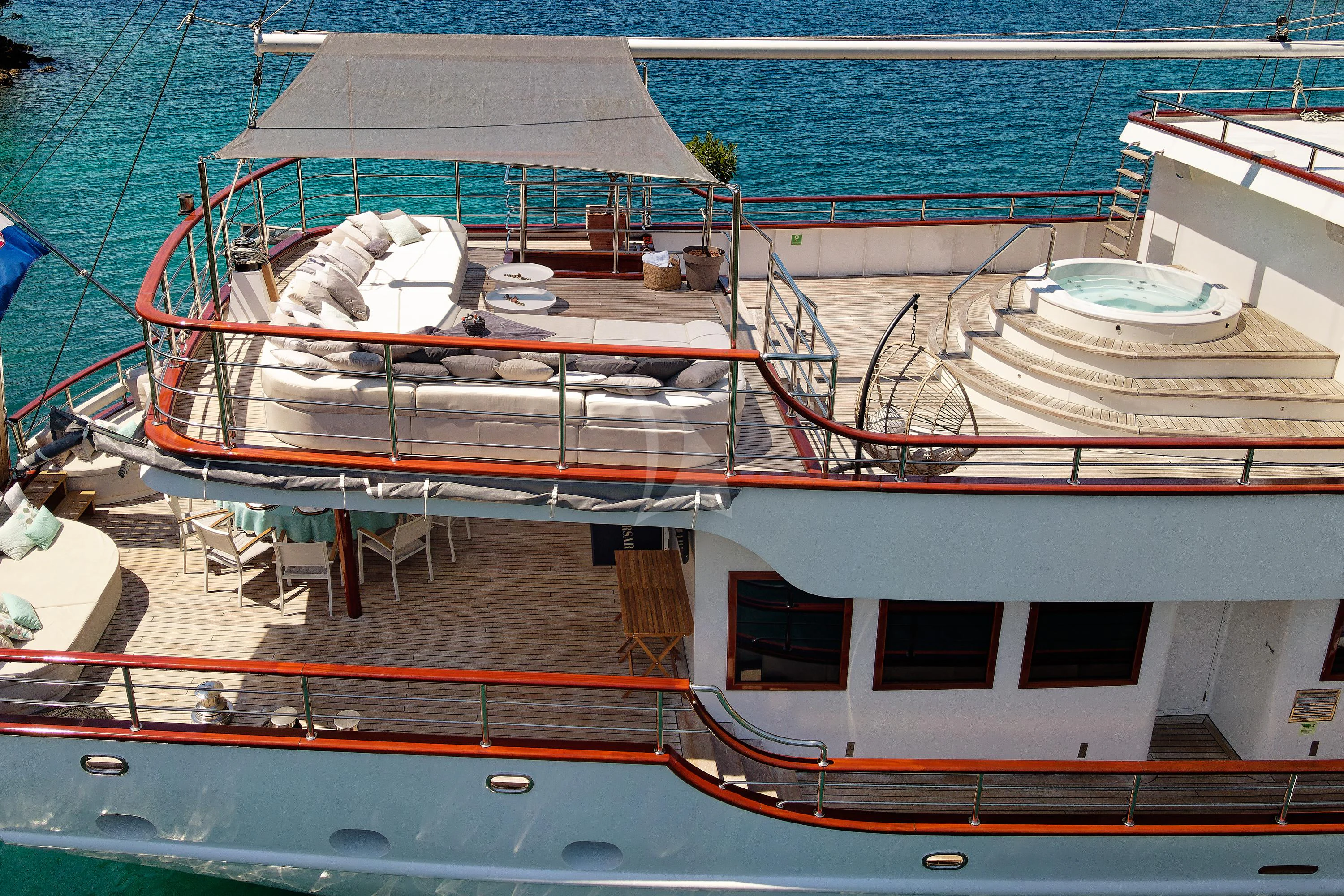 a boat docked at a pier aboard CORSARIO Yacht for Charter