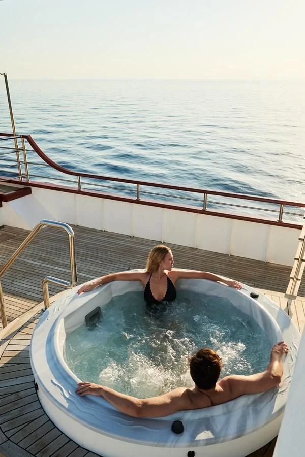 two people in a pool aboard CORSARIO Yacht for Charter