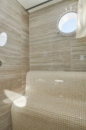 a bathroom with a mirror aboard CORSARIO Yacht for Charter