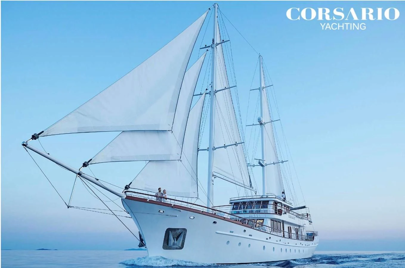 a white boat on the water aboard CORSARIO Yacht for Charter