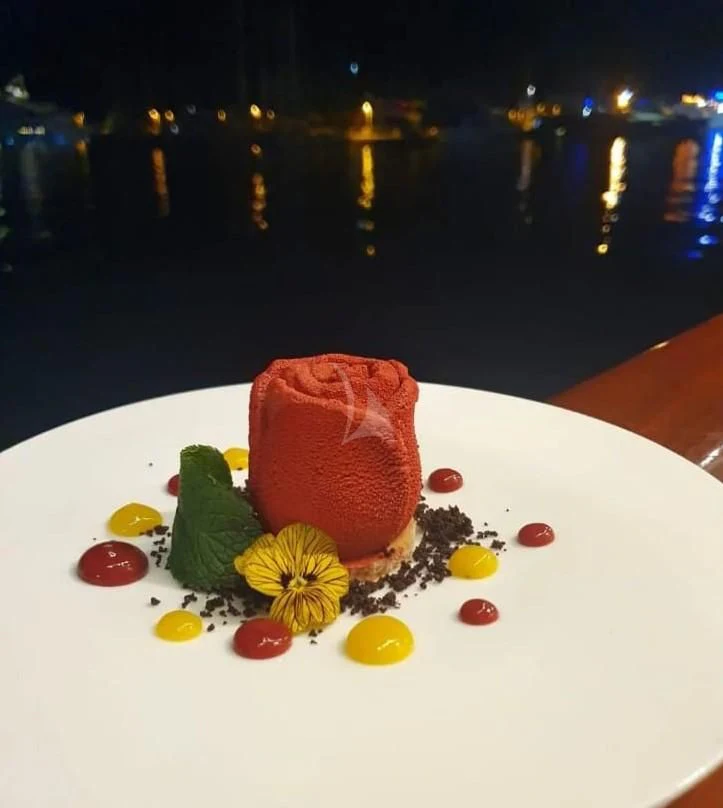 a plate of sushi aboard CORSARIO Yacht for Charter