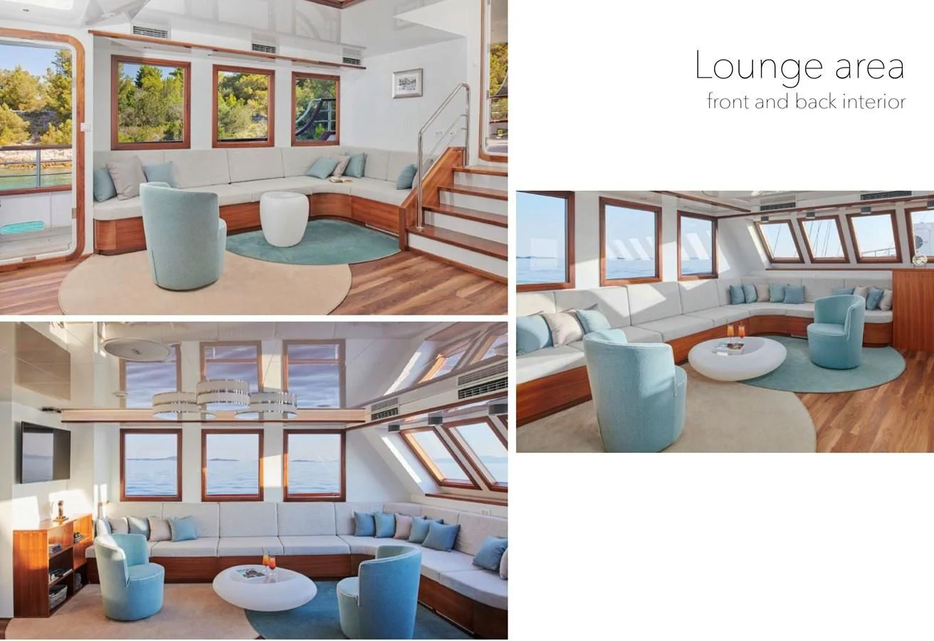 a room with a bench and a table aboard CORSARIO Yacht for Charter