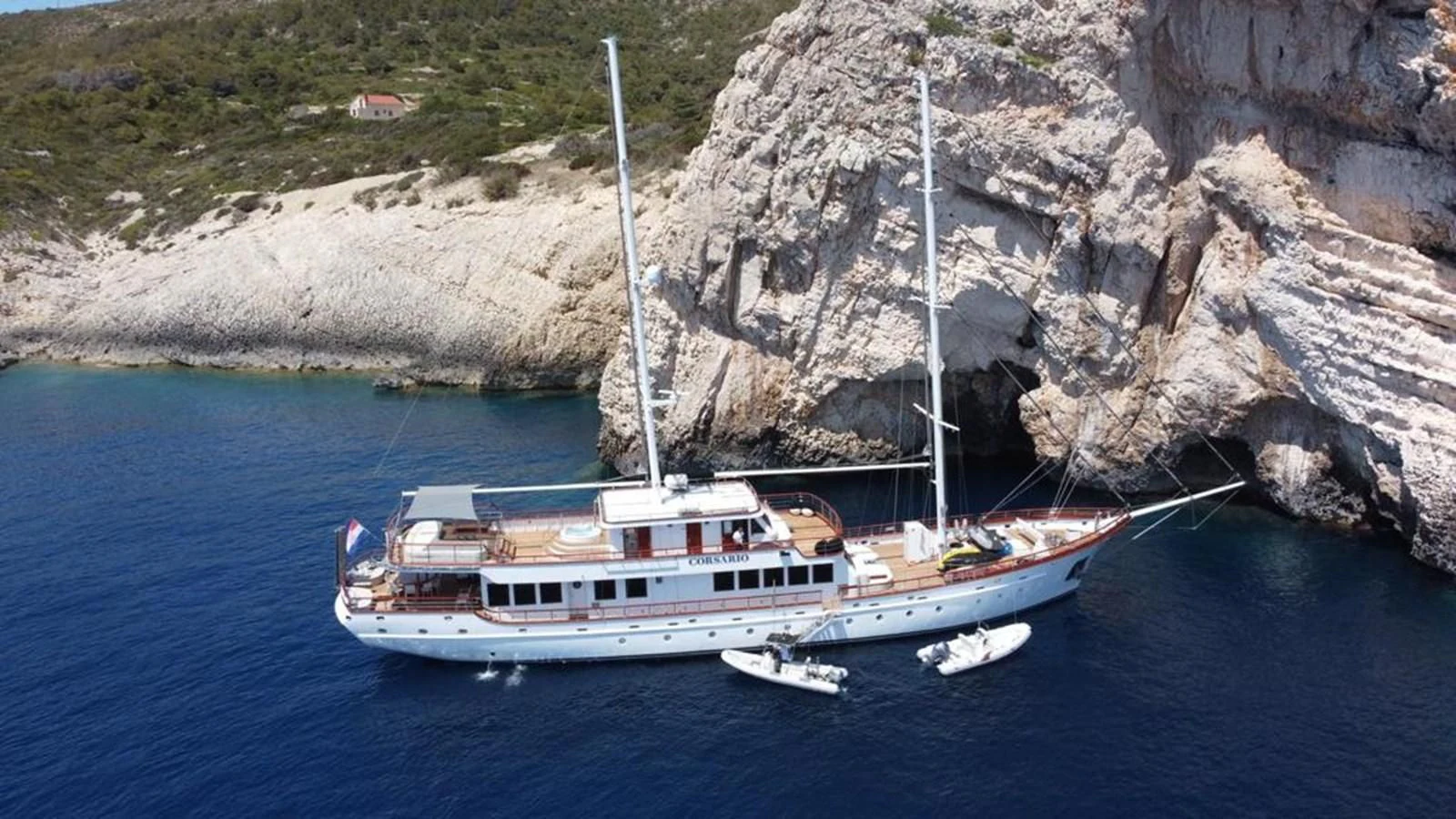 a boat sailing in the water aboard CORSARIO Yacht for Charter