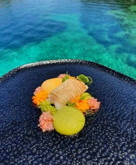 a lemon and a lime on a blue surface aboard CORSARIO Yacht for Charter