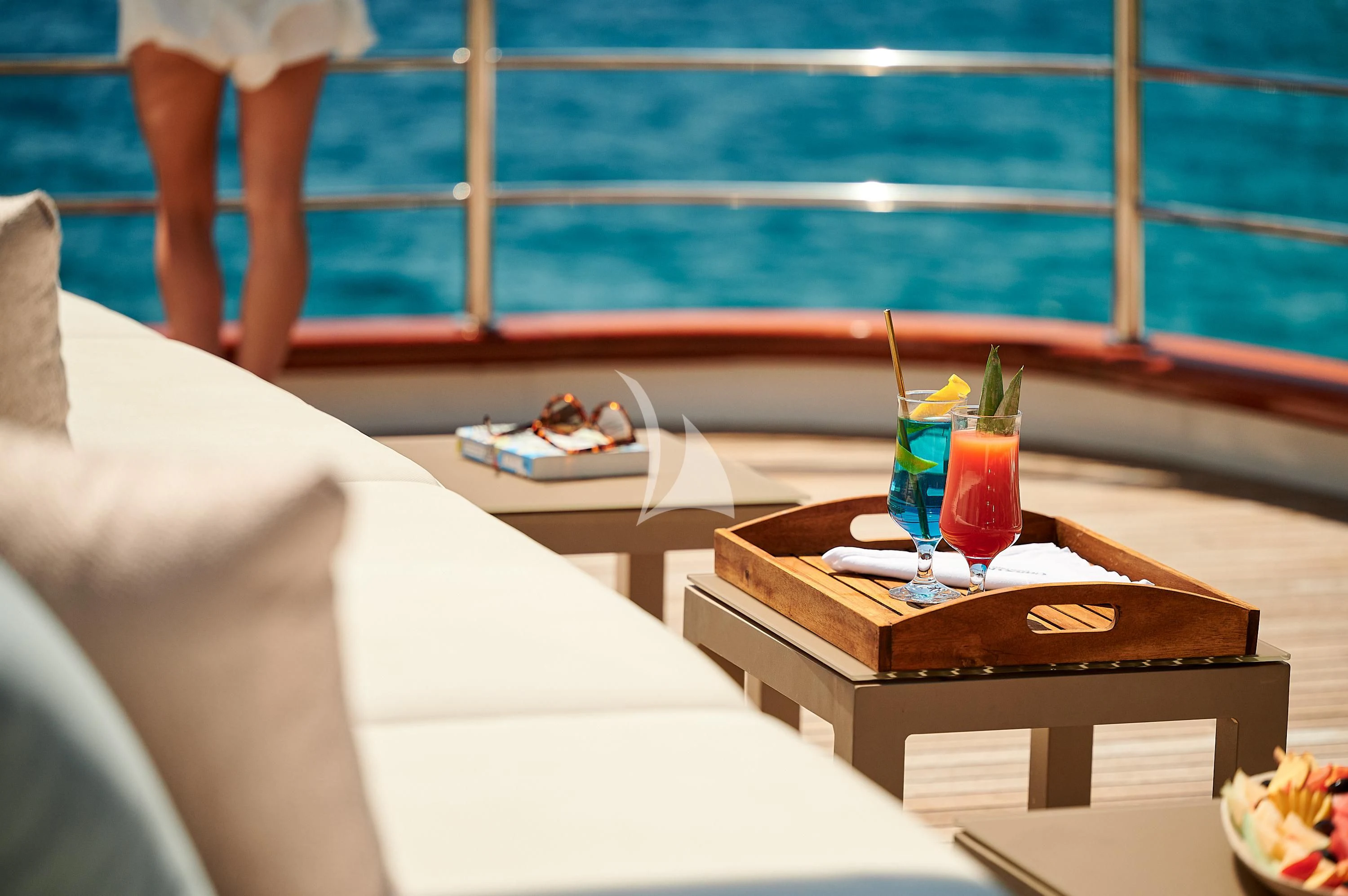 a table with drinks on it aboard CORSARIO Yacht for Charter