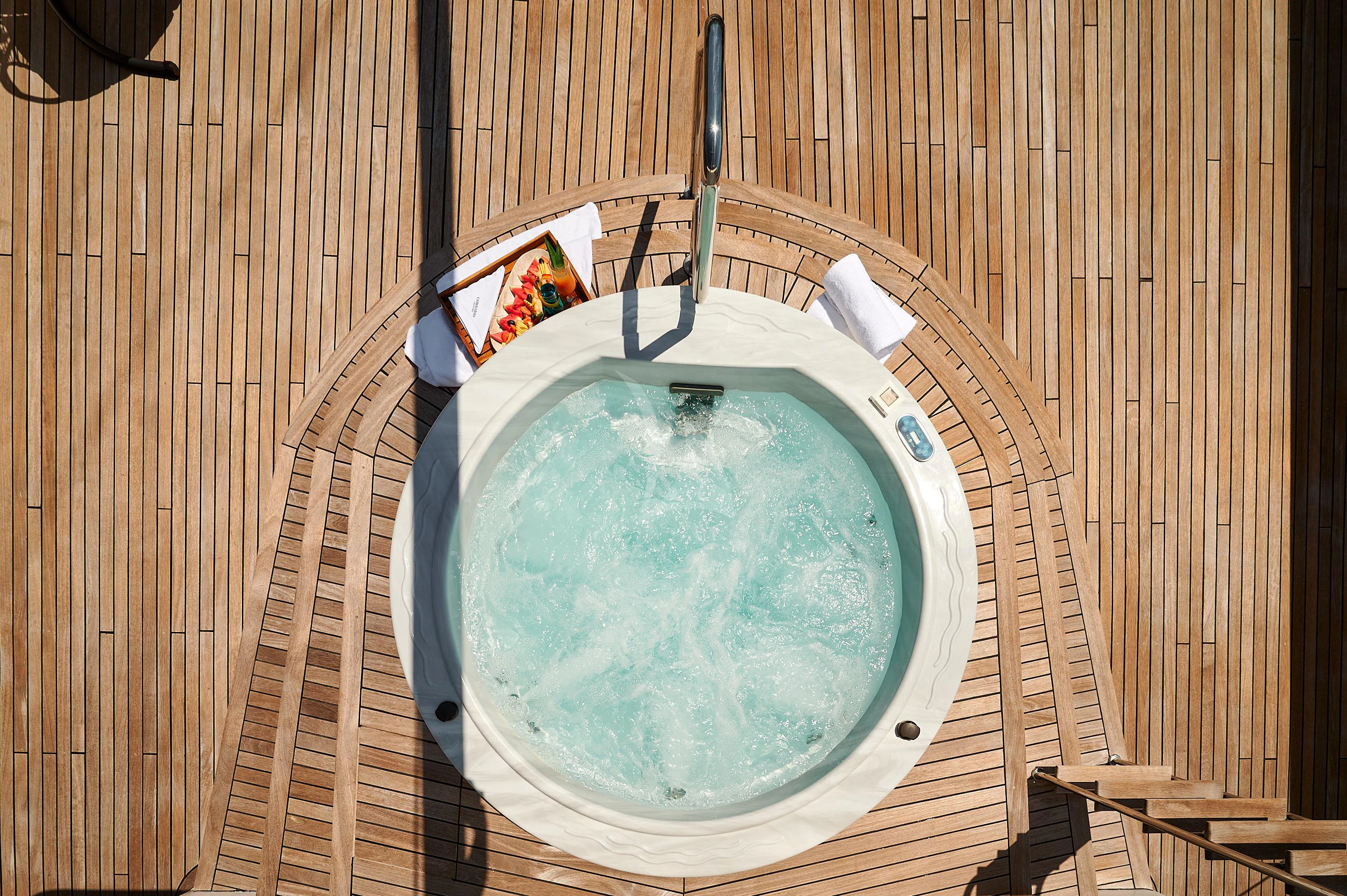 a bucket on a wood floor aboard CORSARIO Yacht for Charter