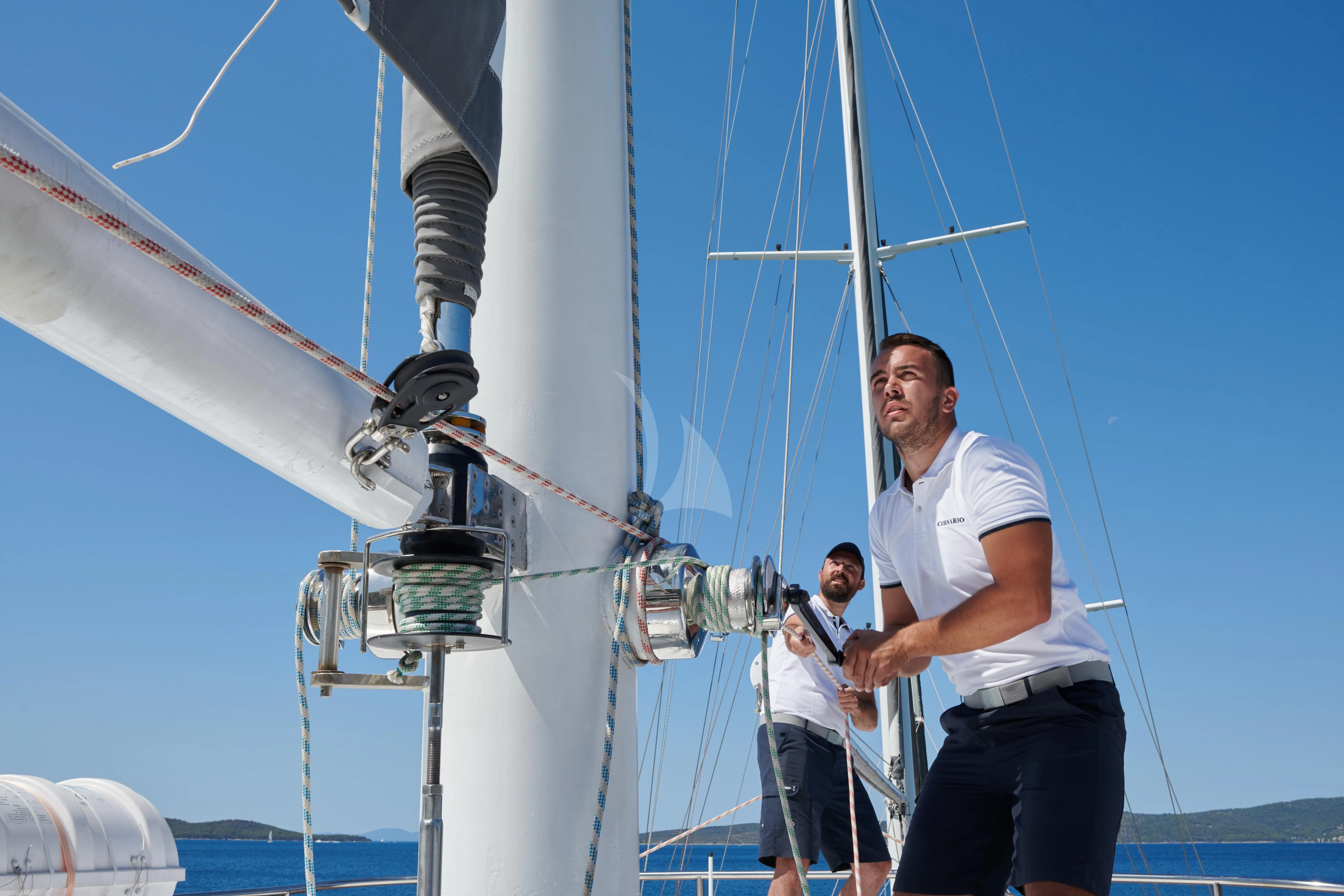 a man standing on a boat aboard CORSARIO Yacht for Charter
